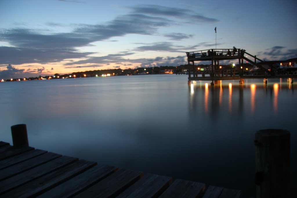 Utila Harbor at dusk by Frank Feurtado