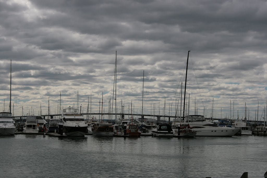 Dark skies over the West Gate by emiljwatson