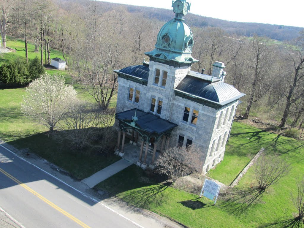 Akin Free Library. Hard to photograph - lots of trees and wires nearby. by Joseph B LeMay