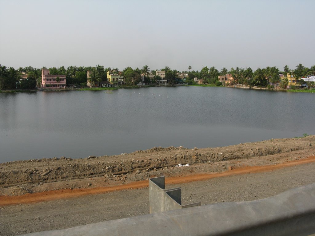 Water Pond Beside NH2 by arijitbanik