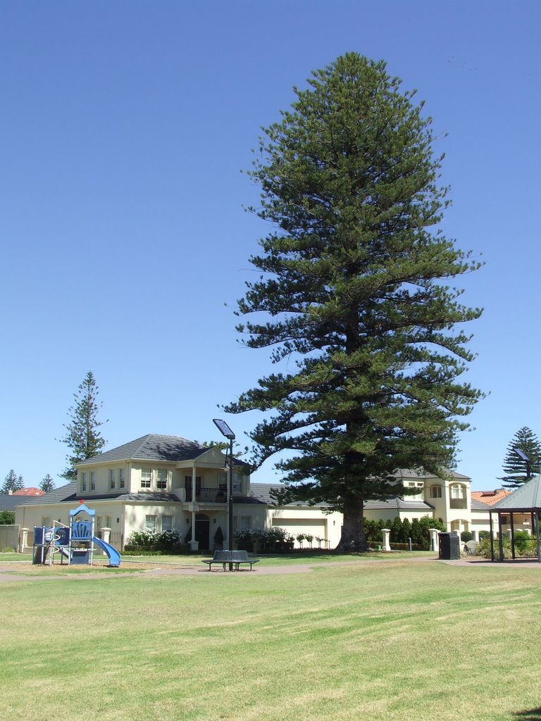 Park with tennis court by Don Nairn