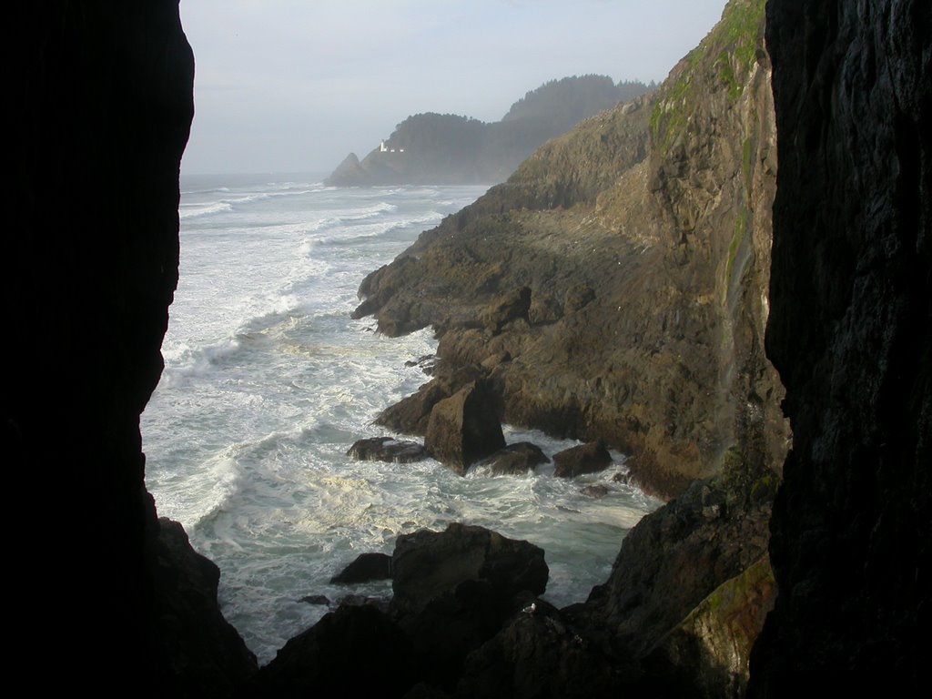 The lighthouse from the natural cave entrance. by Abbernomad