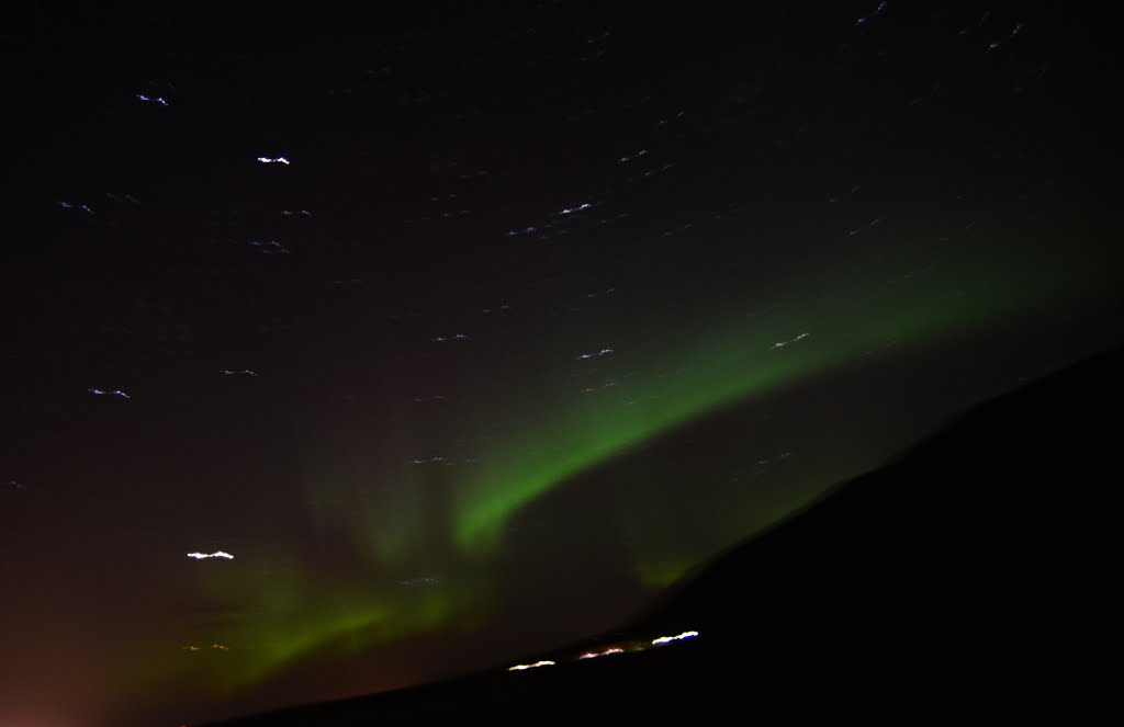 Northern Light (Aurora) (a natural light display in the sky in the Arctic or Antarctic, caused by the collision of energetic charged particles with atoms in the high altitude atmosphere) 冰島 北極光 by Cheuk