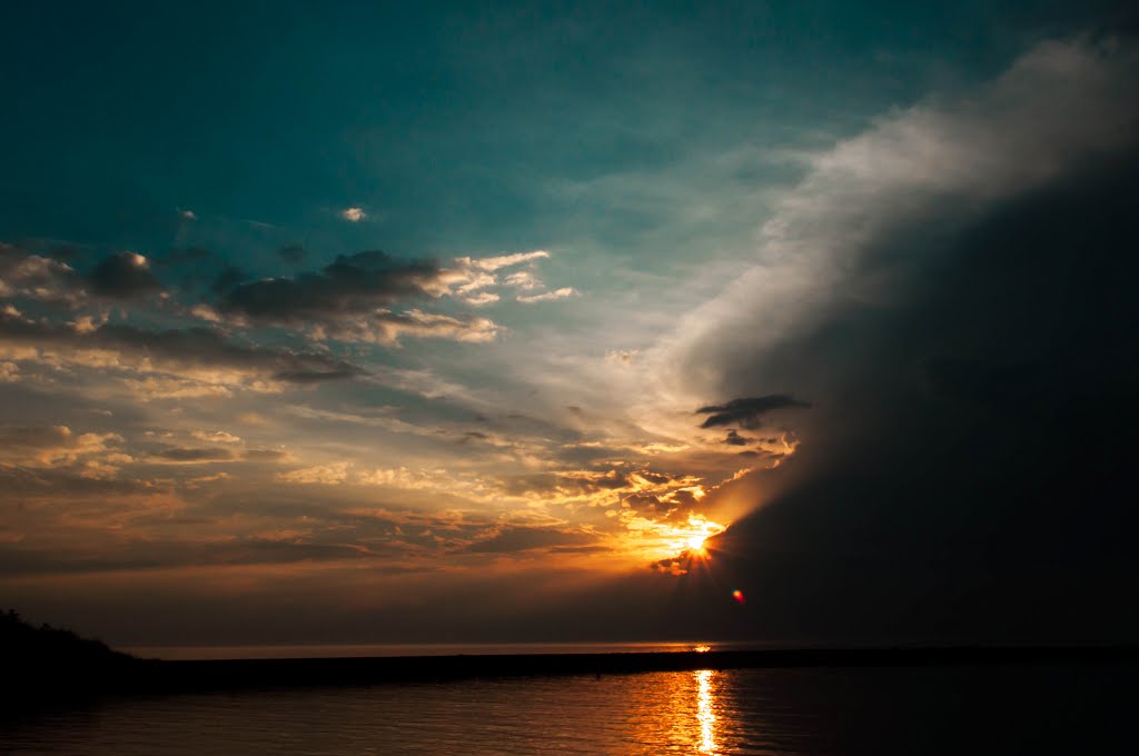 Rays of the Sun above Baltic Sea in Mrzeżyno... by Krzysio Milewicz