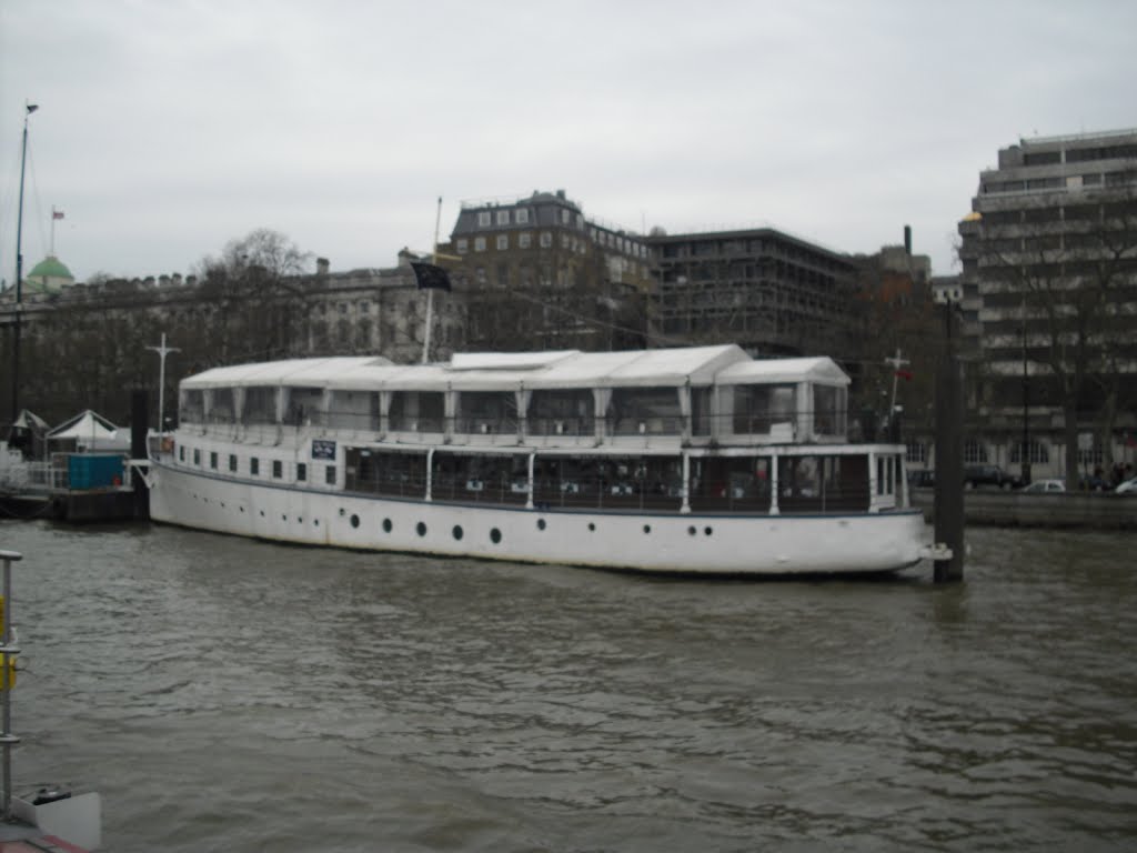 Restaurant on thames river by romi gatti