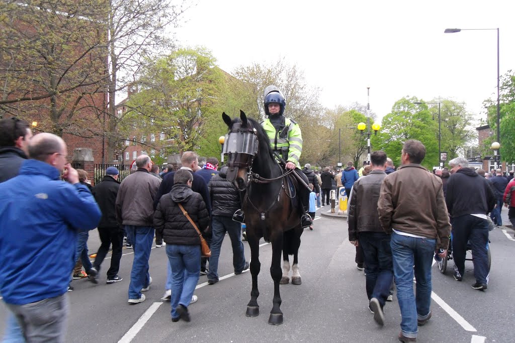 Mounted policewoman at QPR v Arsenal (0-1) on 4 May 2013 by dimitris kountis