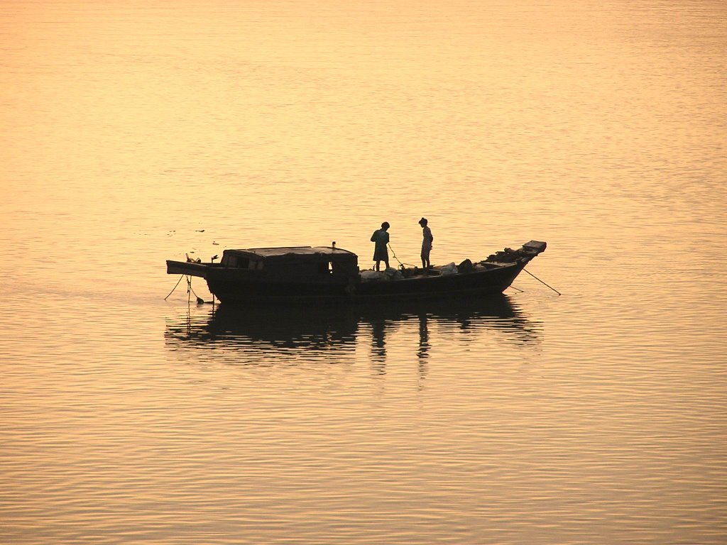 Fishingboat Early morning on Saigon River 2 by Anthon Anthoniussen