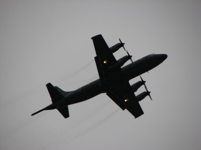 For about six months this plane kept buzzing downtown vancouver, reportedly to image downtown for the olympics by snorth