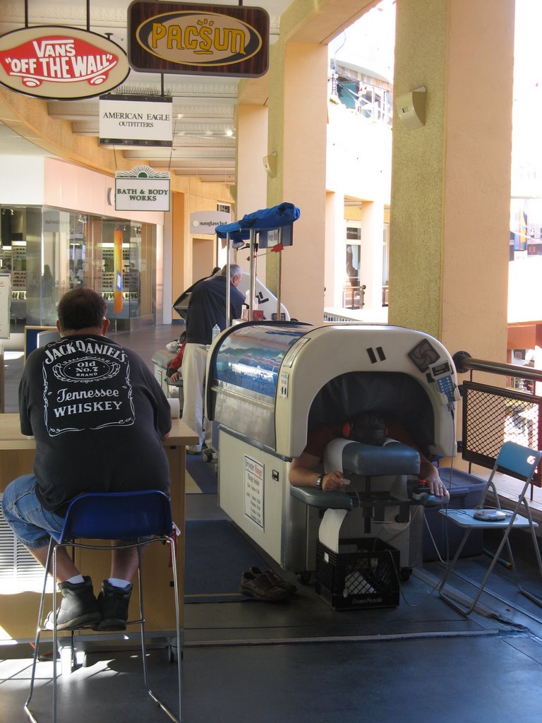 Pausing for a water massage in the midst of shopping by goinc2c