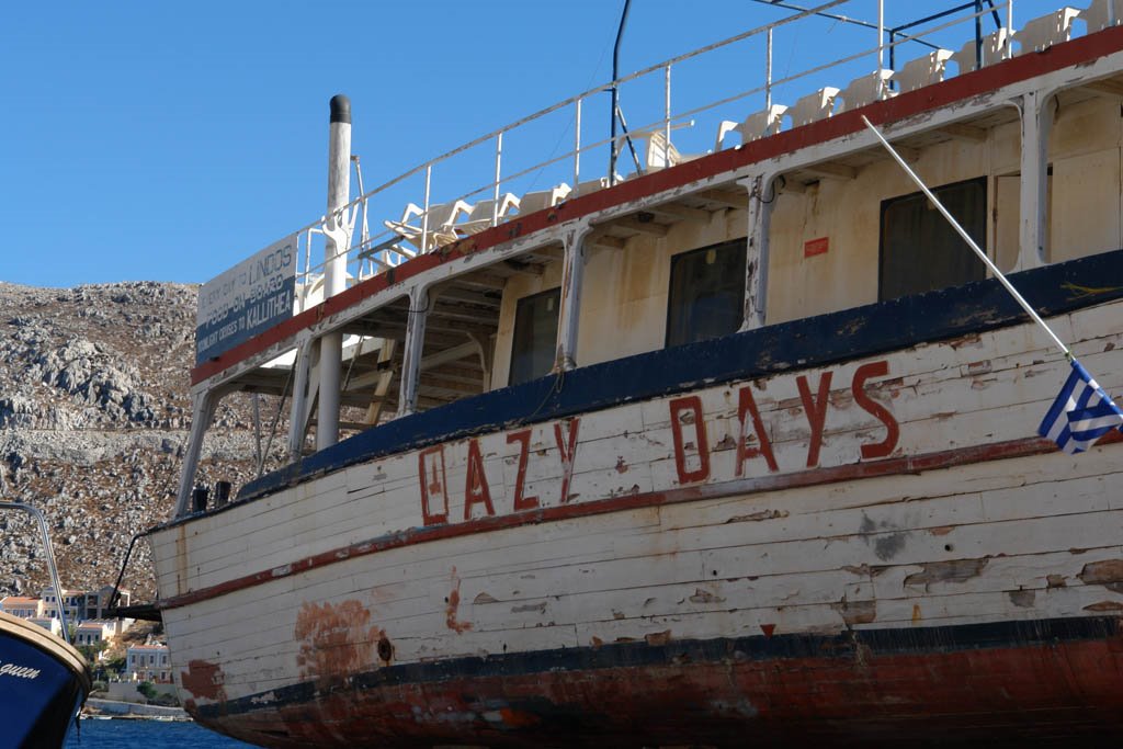 symi island - lazy days old boat by mariantita