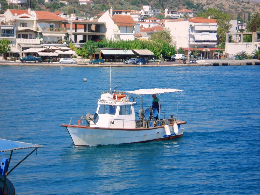 Astakos, back from fishing. by aris patelos