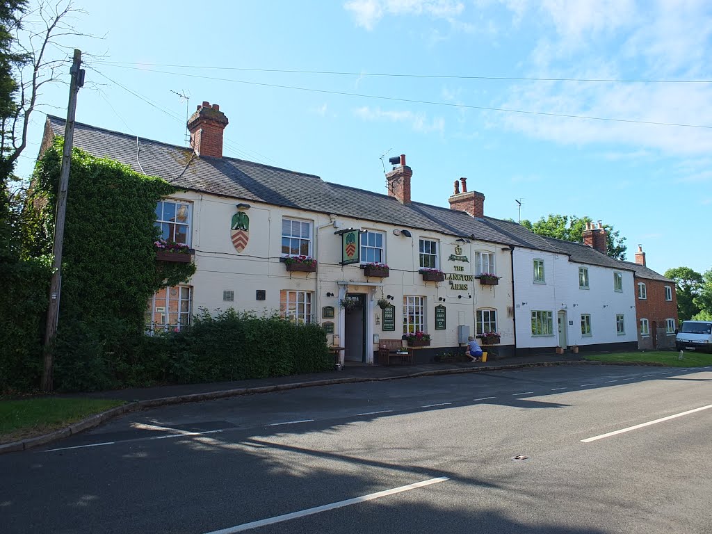 The Langton Arms and row of cottages, a village scene at Church Langton. by Bobsky.