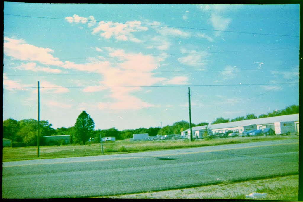 Storage Buildings And Empty Lot, Near Thomas Park by "Teary Eyes" Anderson