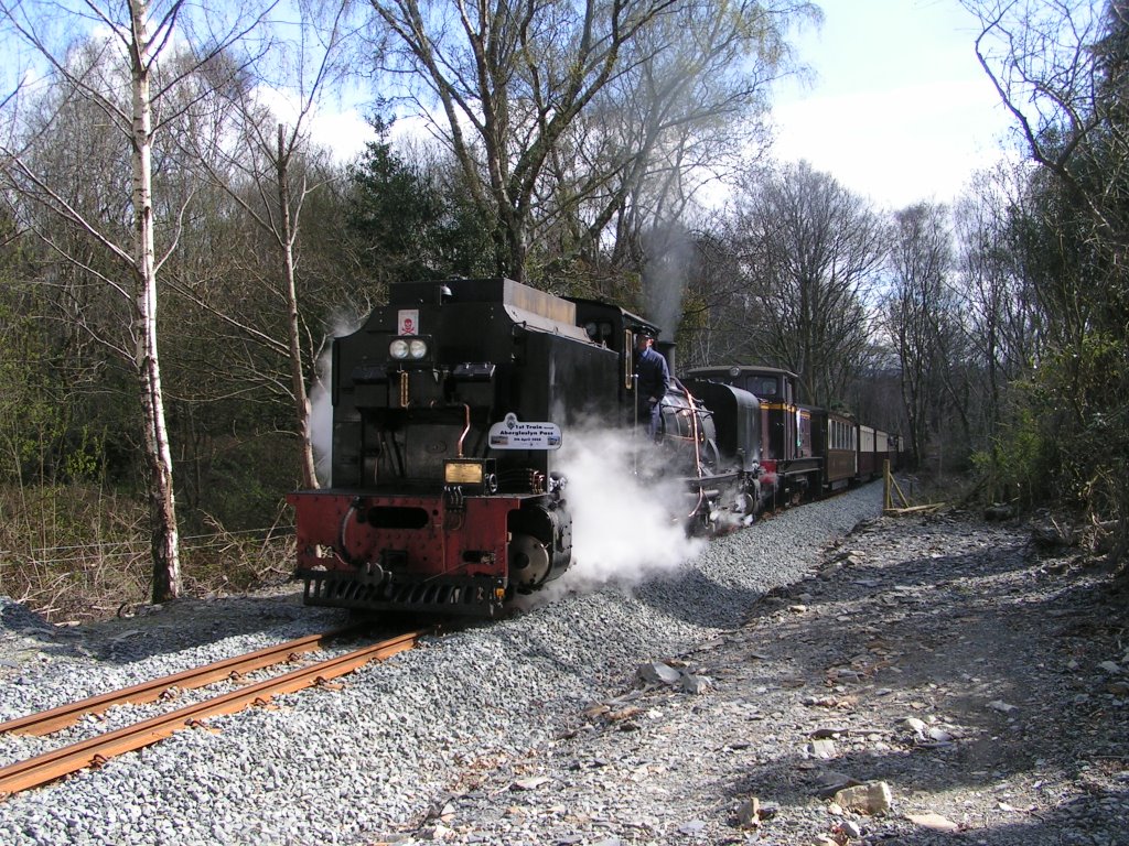 Train to Beddgelert approaching Nantmor level crossing by Bob Cable