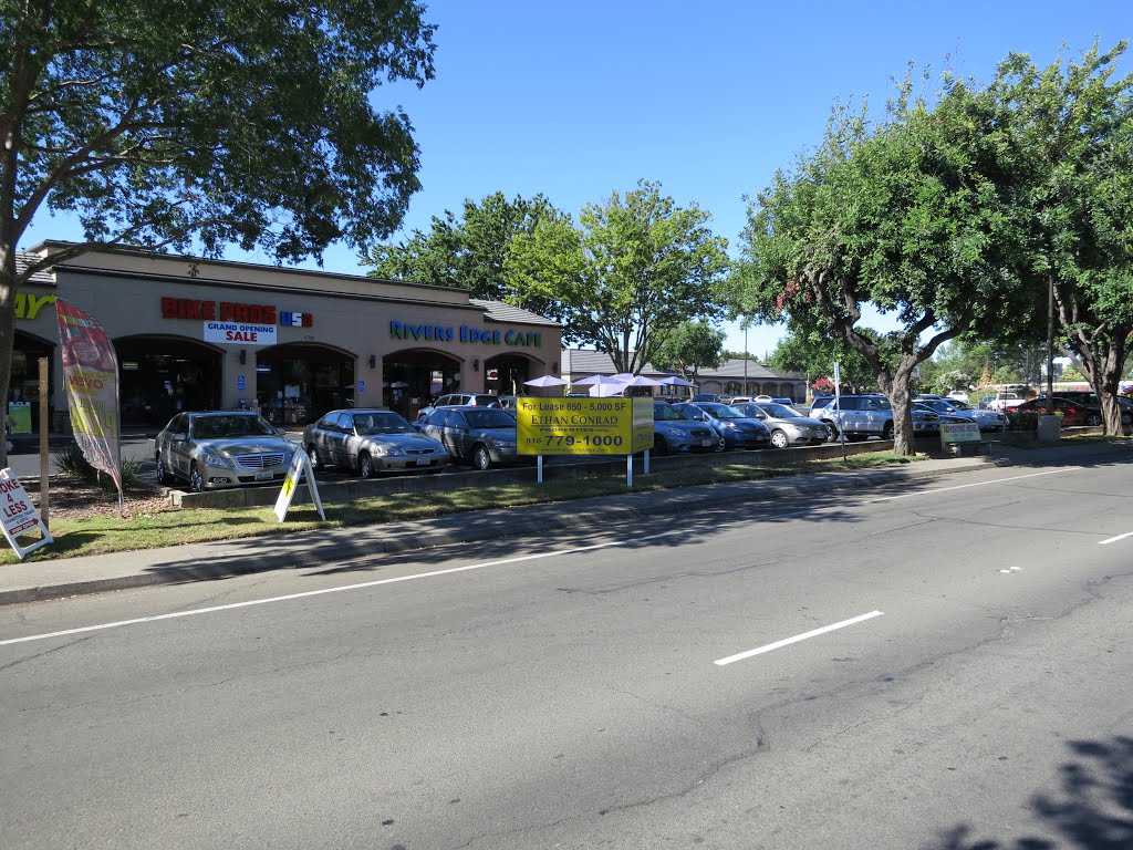 Strip mall shops on La Riviera. by VasMan