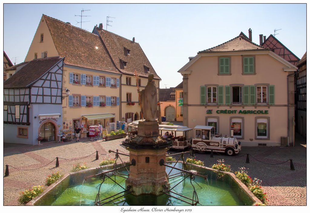 Fontaine St-Léon et Place du Chateau Eguisheim by Olivier Heimburger