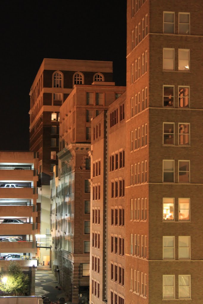 Downtown KC buildings at night by Brian Zurita