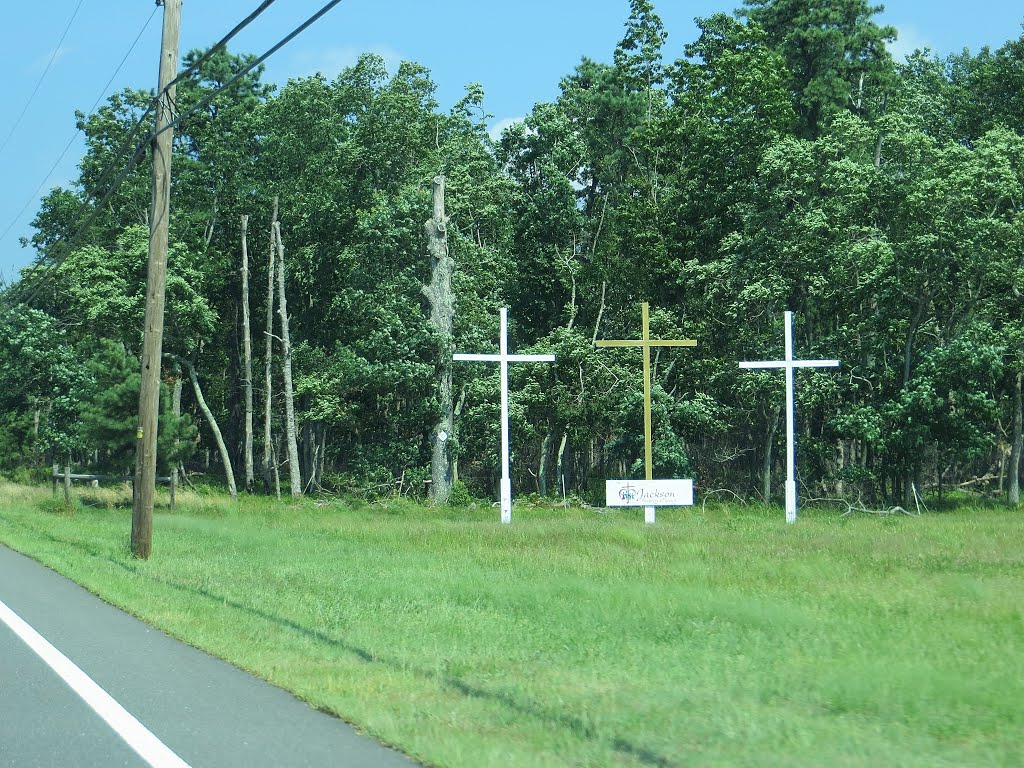 Three Wooden Crosses by Adam Elmquist