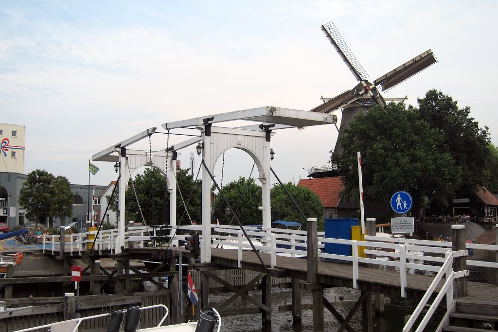 Typical Dutch design traditional wooden bridges that can be opened easily at Harderwijk harbour by Henq