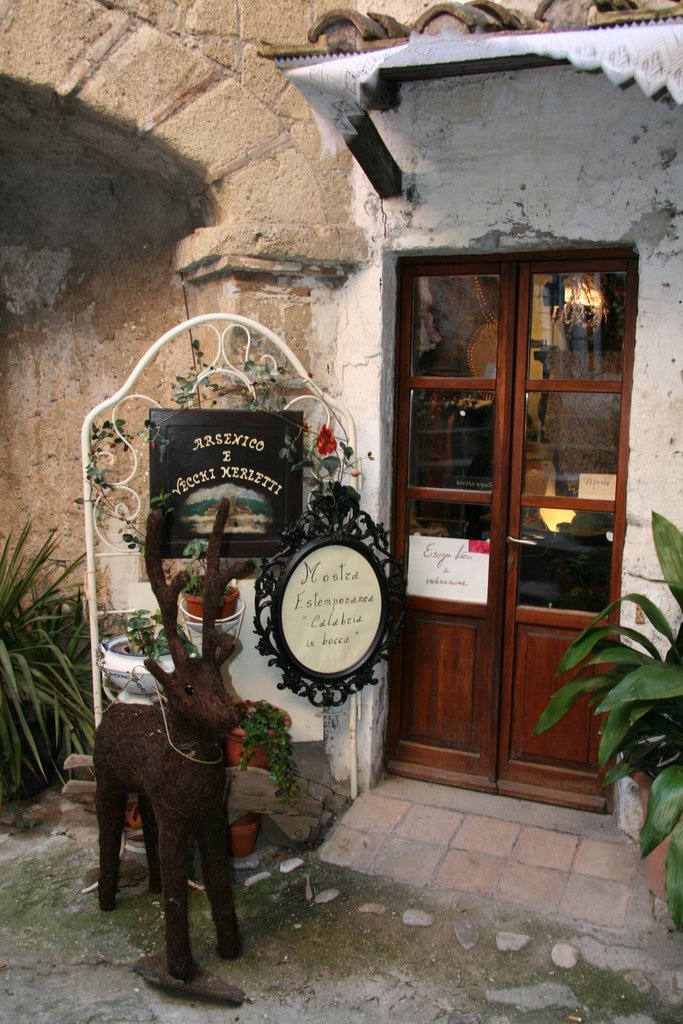 Small store in the alleys of Calcata by Roberto Filippini