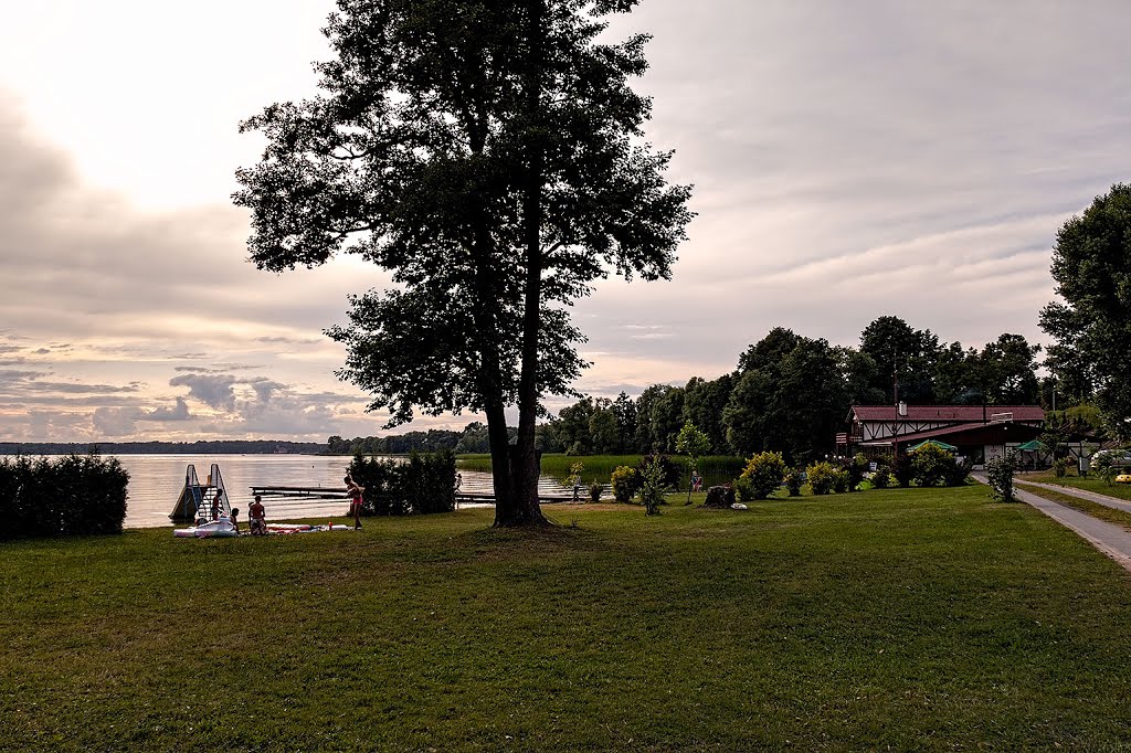 Campsite at the lake Niegocin by Roger Medin