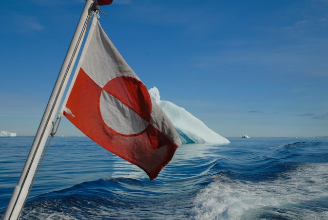 The flag of Greenland, Disko, Greenland by Mikkel Fruergaard