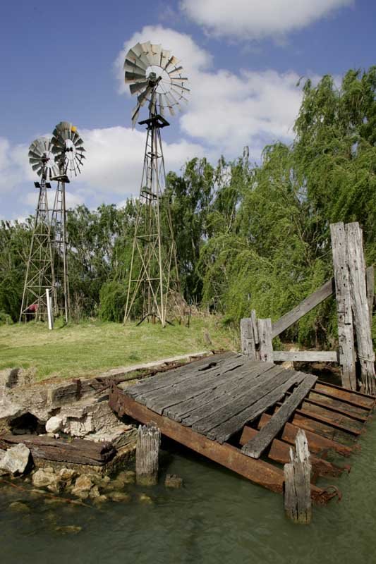 Windmills and the old ferry ramp on the River Murray at Wellington. To see more images like this, visit www.freewebs.com/philwillmedia by philwillmedia