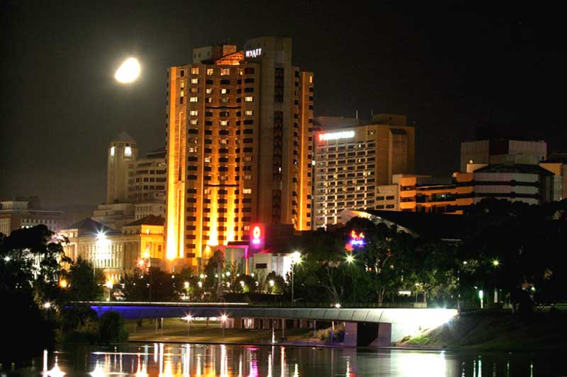 The moon rises over the Hyatt Hotel and Lake Torrens in Adelaide. To see more images like this, visit www.freewebs.com/philwillmedia by philwillmedia