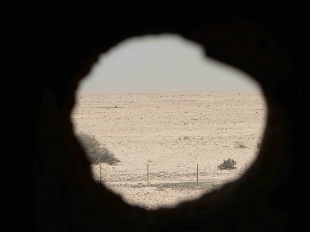 View from a fire hole on Al Zubarah Fort by arlettcsaba