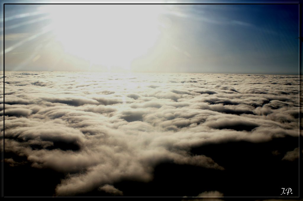 Clouds seen from plane by Joerg Petersen