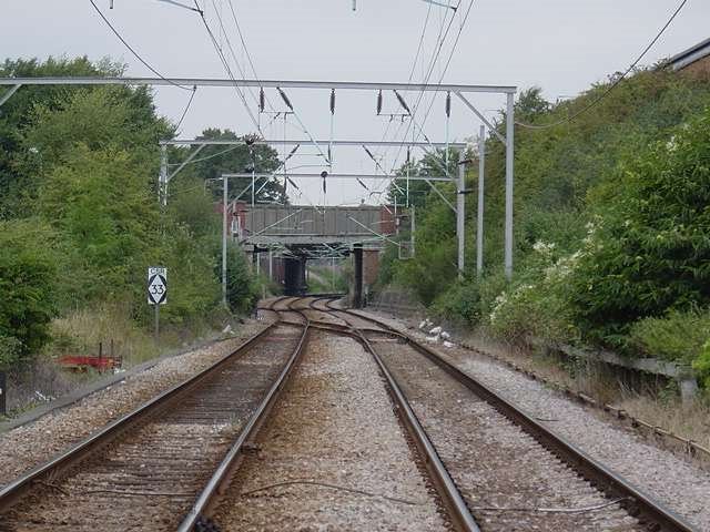 East Gate Junction level crossing looking towards Ipswich Road Bridge by Robert Shepter