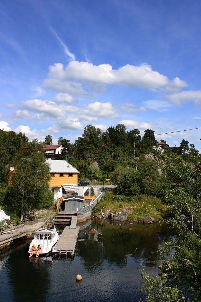 Sunshine, beautiful clouds and a yellow house by Mona Lygre