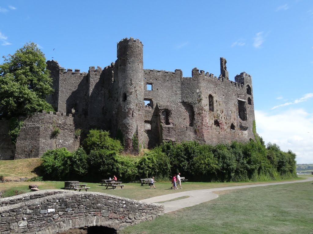 Across the bridge to Laugharne Castle by Karen Price