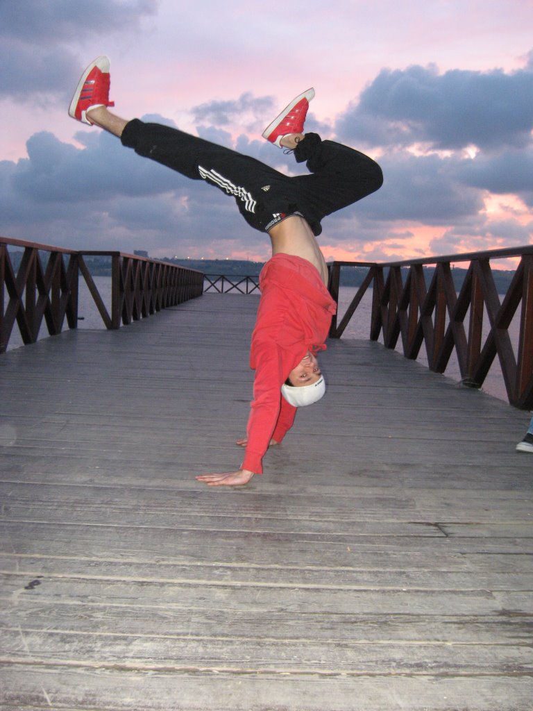 An other handstand on the Pier by Aysuhan Ufi