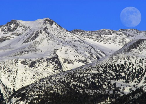 Full moon next to Armchair glacier by richphotography.ca