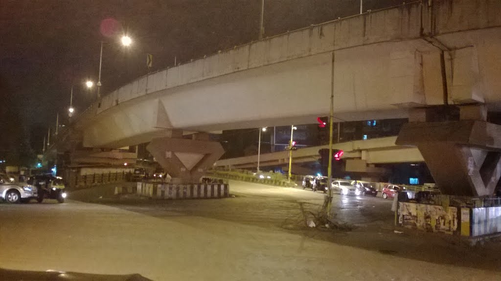 Below Barfiwala flyover, Andheri West by Umesh Pandit