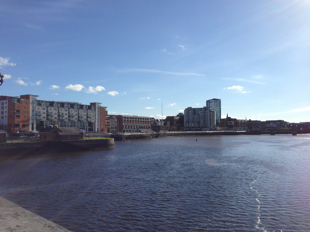 View from Sarsfield Bridge, Limerick of River Shannon. by fire.house