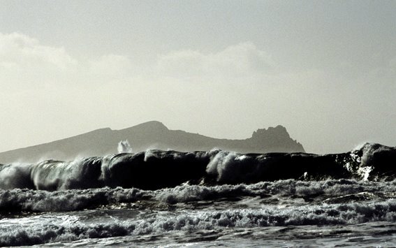 Waves & Inis Tuaisceart island (the Dead man), Blasket Islands, Co Kerry, Ireland. by 2c