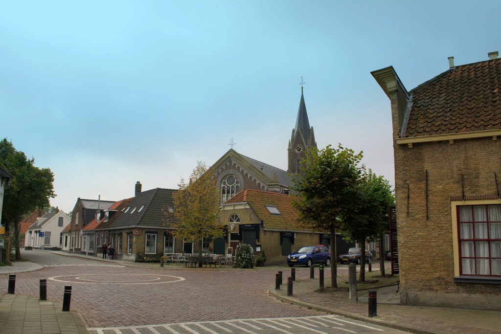 In het centrum van Zonnemaire met zicht op de Hervormde kerk uit 1867. by watersnip