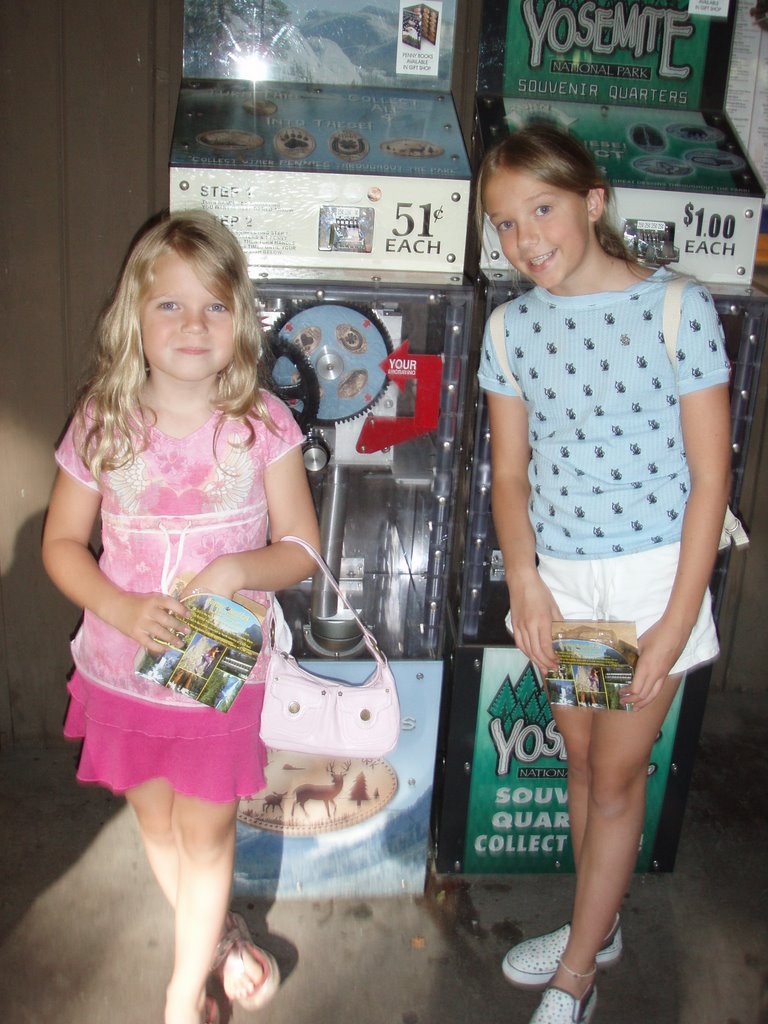 Girls next to Penny machine in Yosemite by abscam