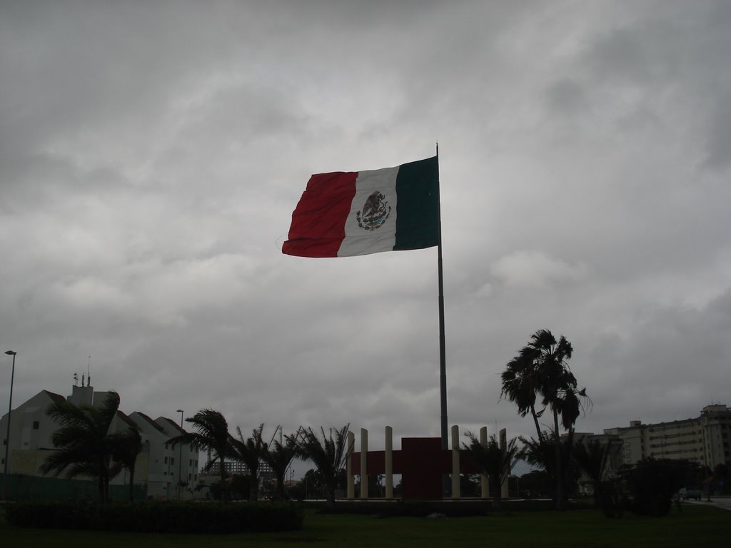 Mexico's Flag Over Cancun on a Rainy / Windy Day by Francisco J. Garcia …