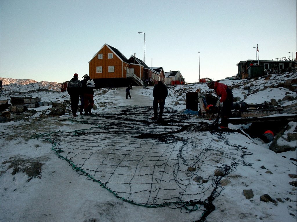 Tidying a net for catching seals by Claus F. Højbak